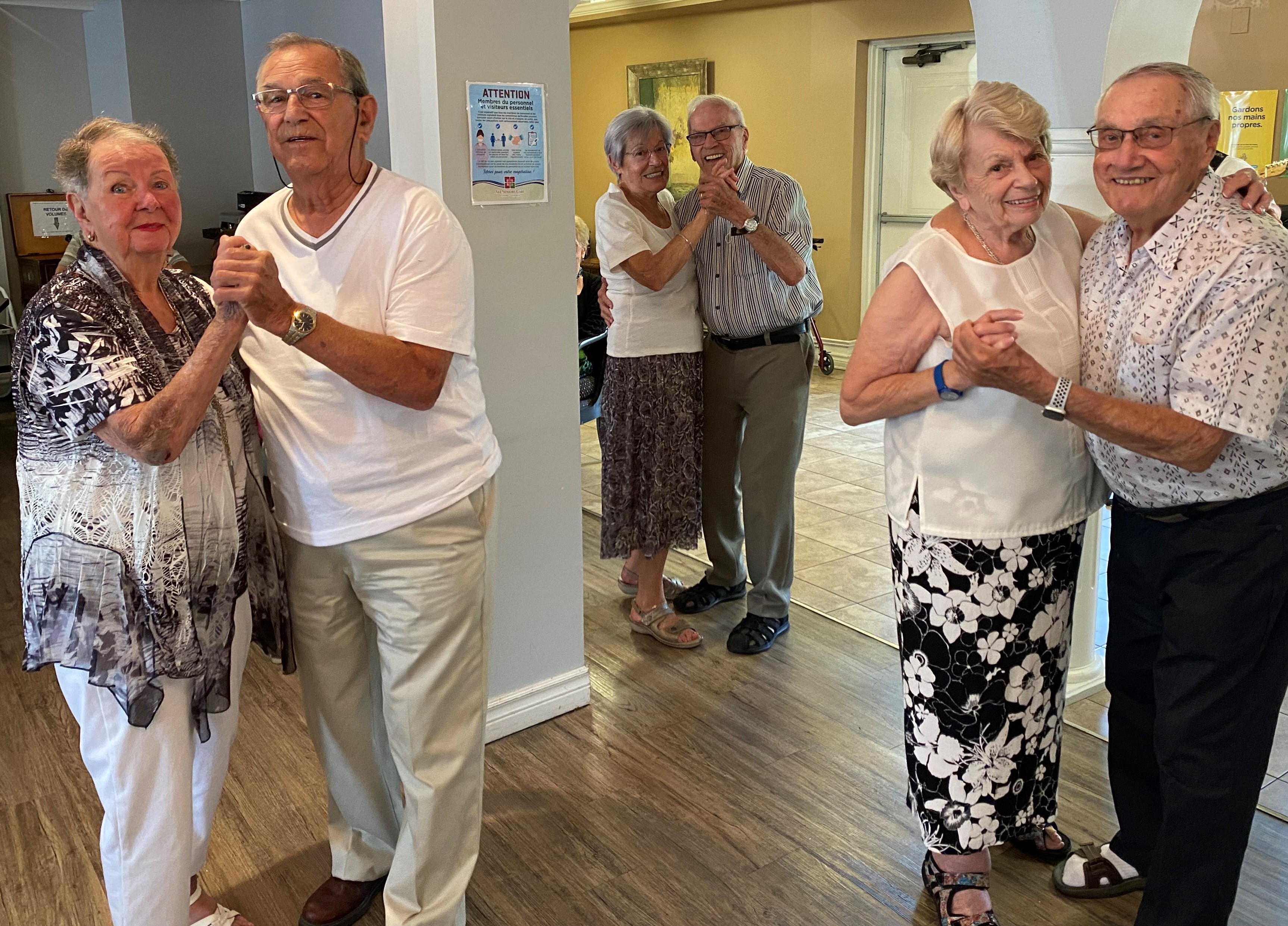 Elderly couples dancing in retirement residence in Quebec Canada
