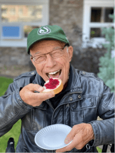 Happy resident eating