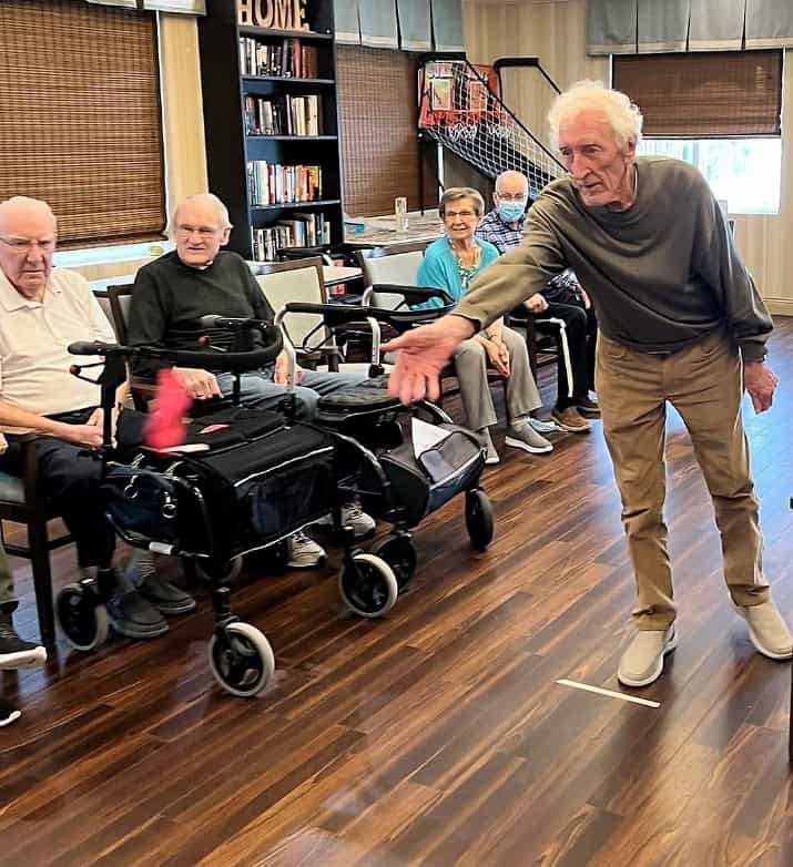 Senior Games - All Seniors Care Senior with Dog