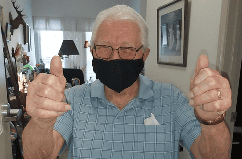 man with two thumbs up