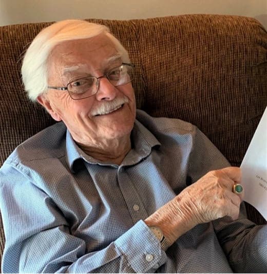 A picture containing person, sofa, indoor